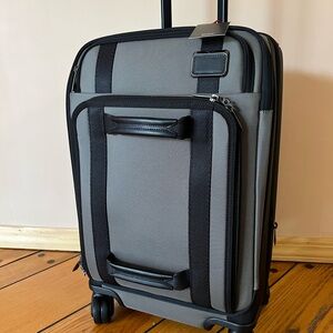 Tumi Merge Continental Front Lid International carry-on suitcase. Brand new!